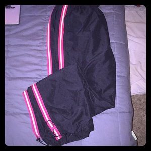 Pink white striped sides black joggers
